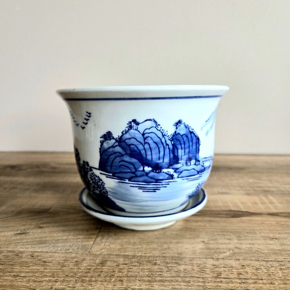 Blue and white Asian ceramic planter with saucer.